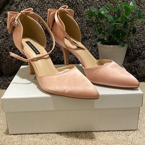 Woman’s rose gold shoes size 7